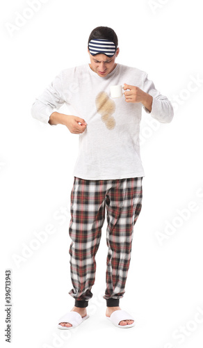 Stressed young man with cof...
