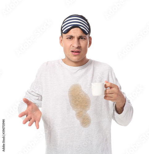 Stressed young man with cof...