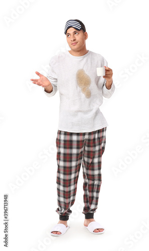 Confused young man with cof...