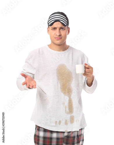 Stressed young man with cof...