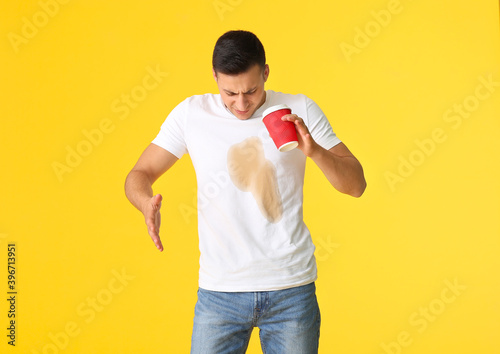 Stressed young man with cof...