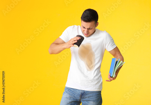 Stressed young man with cof...