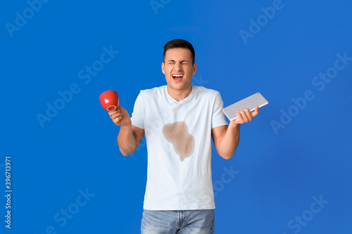 Screaming young man with co...