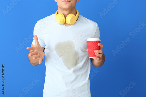 Young man with coffee stain...