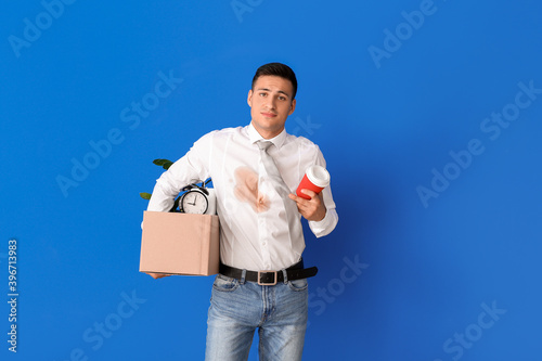 Young businessman with coff...