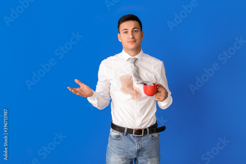 Young man with coffee stain...