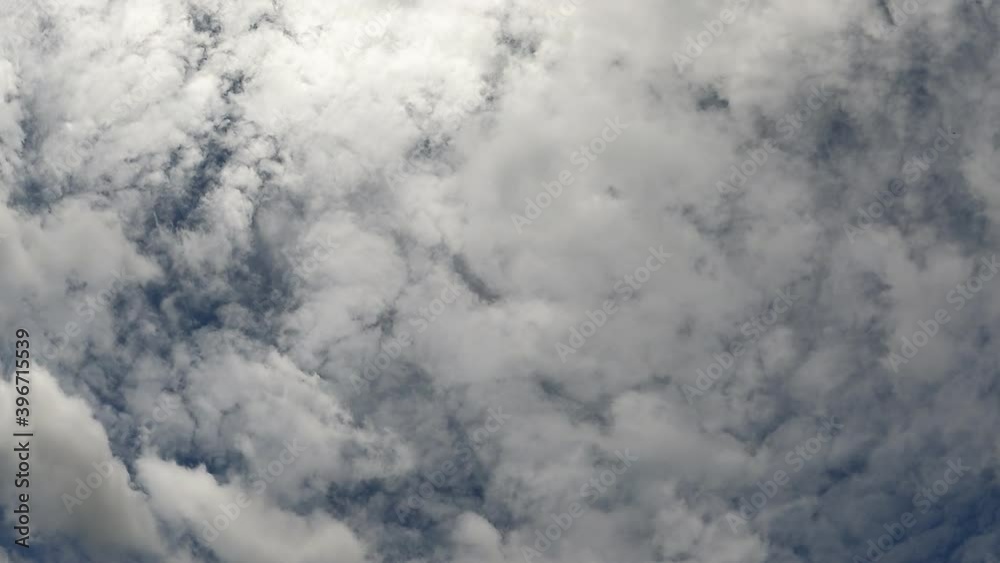 Stock 4k: Time lapse, timelapse video of clear blue sky white fluffy clouds. Royalty high-quality free stock timelapse footage of blue sky and white cloud. Time-lapse of natural cloudscape background