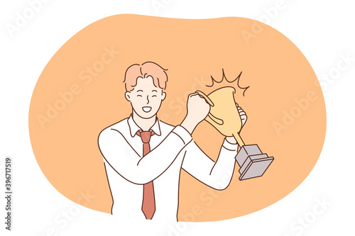 Success, leadership, business development concept. Happy young businessman cartoon character holding golden trophy and feeling excited with successful project realisation or profitable deal