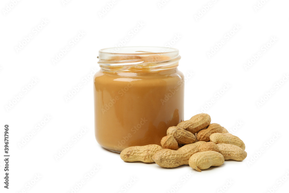 Peanut and jar with peanut butter isolated on white background Peanut and jar with peanut butter isolated on white background
