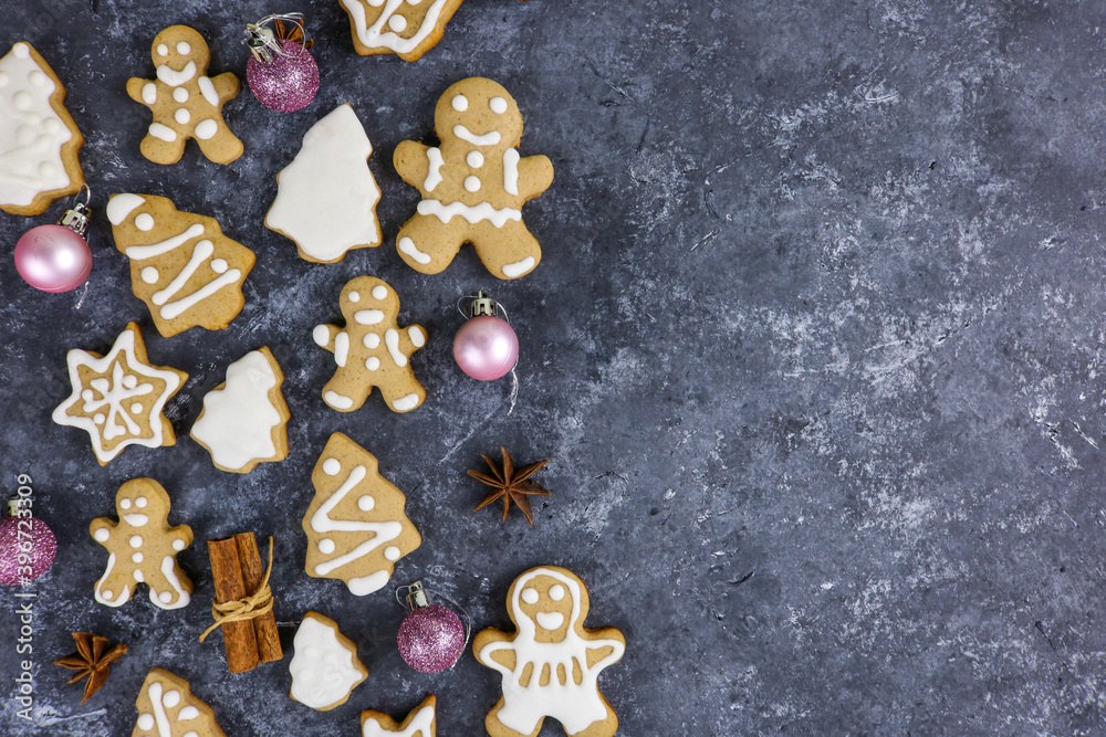 gingerbread with cinnamon on a dark background gingerbread with cinnamon on a dark background