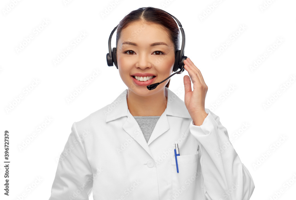 medicine, profession and healthcare concept - happy smiling asian female doctor or scientist in headset over white background medicine, profession and healthcare concept - happy smiling asian female doctor or scientist in headset over white background