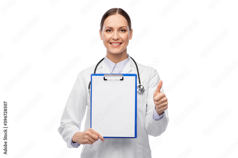 medicine, profession and healthcare concept - happy smiling female doctor in white coat showing clipboard and thumbs up gesture medicine, profession and healthcare concept - happy smiling female doctor in white coat showing clipboard and thumbs up gesture