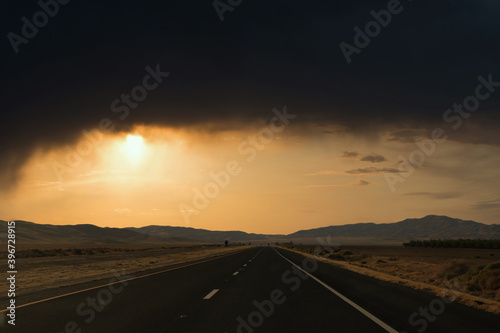 Photoshop landscape of roads  hills at sunset.