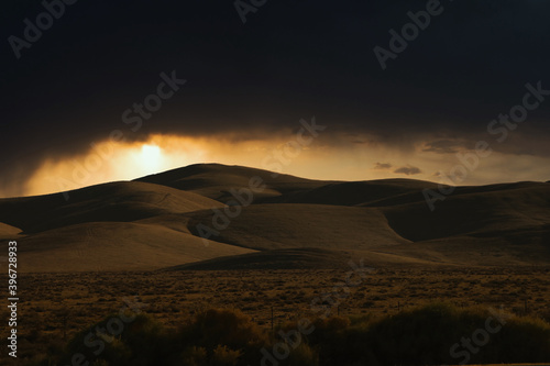 Photoshop landscape of roads, hills at sunset.