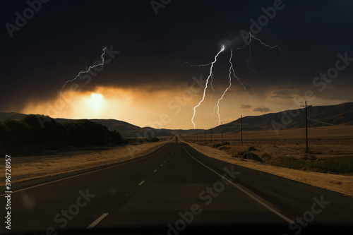 Photoshop landscape of roads, hills at sunset.