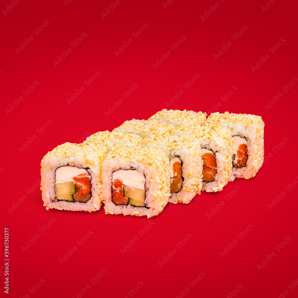 Japanese cuisine sushi and rolls isolated on a red background