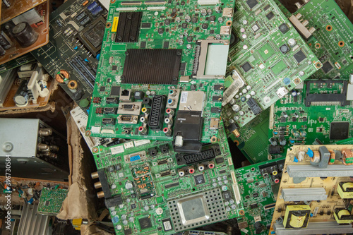 A box of broken LCD TV motherboards. Electronics repair shop