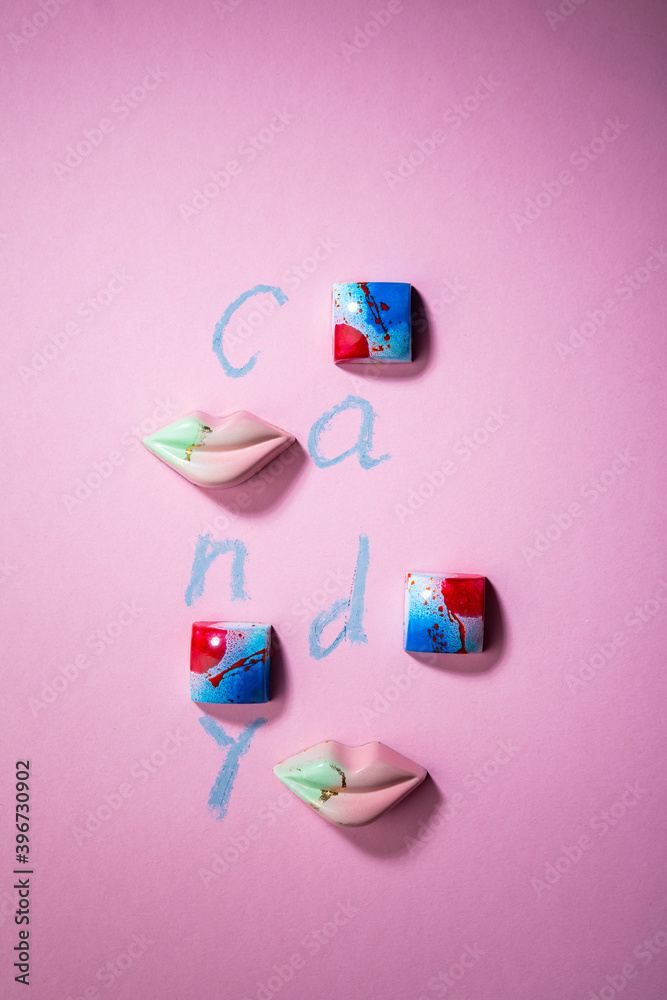 Overhead view of candies on pink background Overhead view of candies on pink background