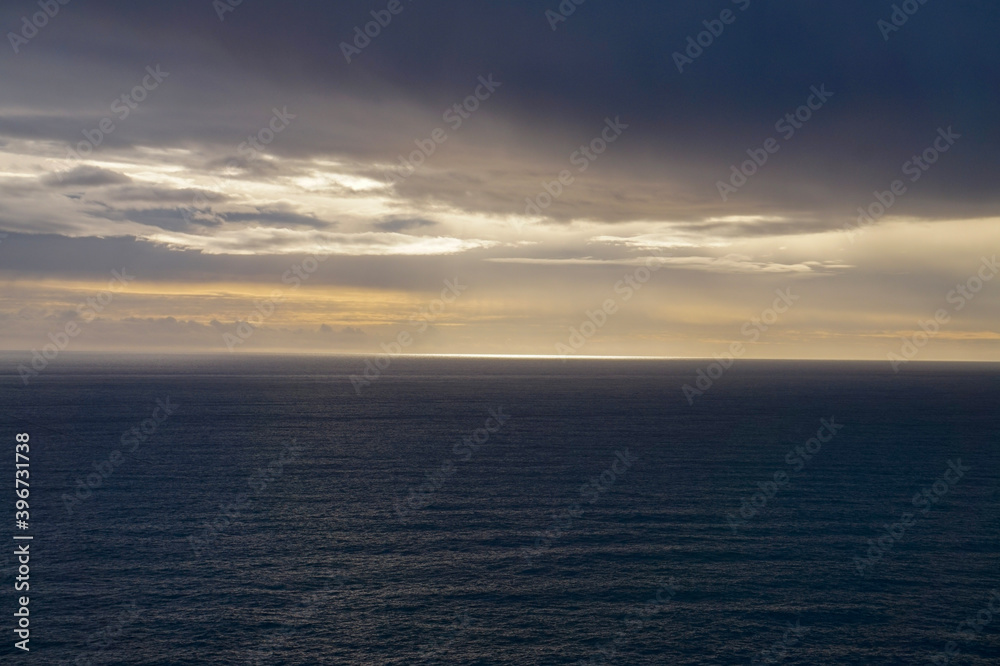 Multilayered clouds over the ocean, looking from Dyrholaey in Iceland Multilayered clouds over the ocean, looking from Dyrholaey in Iceland