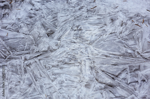 texture ice cracks  white ice crystals  winter frost background