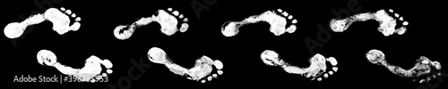 Human white footprints way black background isolated, barefoot person foot print pattern, walking path, footsteps silhouette illustration, bare feet route trail, ink imprint, stamp, mark, sign, symbol