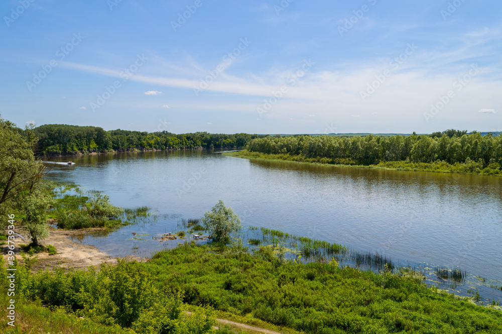Fototapeta premium Shore of the Don river in the environs of Rostov-on-Don, Rostov region. Summer landscape in Veshenskaya village