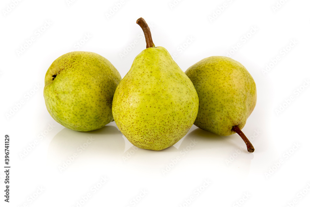 Three ripe pears isolated on white background. Still life picture taken in studio with soft-box. Three ripe pears isolated on white background. Still life picture taken in studio with soft-box.