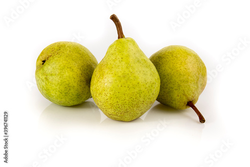 Three ripe pears isolated on white background. Still life picture taken in studio with soft-box.