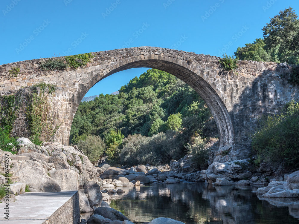 Gorge of the Alardos river in Madrigal de la Vera, Caceres. Stone arched bridge in Extremadura, Spain