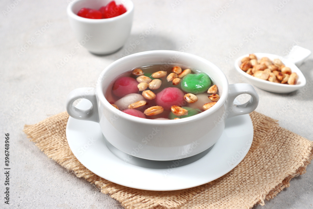 Wedang Ronde, an Javanese traditional dessert made of glutinous rice flour filled with peanut in ginger syrup Wedang Ronde, an Javanese traditional dessert made of glutinous rice flour filled with peanut in ginger syrup