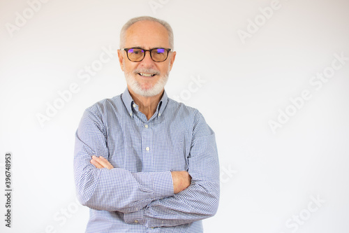 happy cheerful man in stylish shirt with arm crossed rejoicing at his retirement. health, beauty concept. free time, spare time.