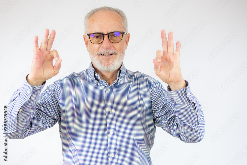 happy positive handsome old man shows Okay sign, no problems, health is Okay everything is okay. close up portrait. isolated white background. happiness, success concept. happy positive handsome old man shows Okay sign, no problems, health is Okay everything is okay. close up portrait. isolated white background. happiness, success concept.