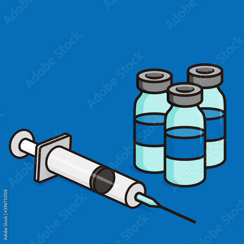 Medical ampoules and syringe on blue background