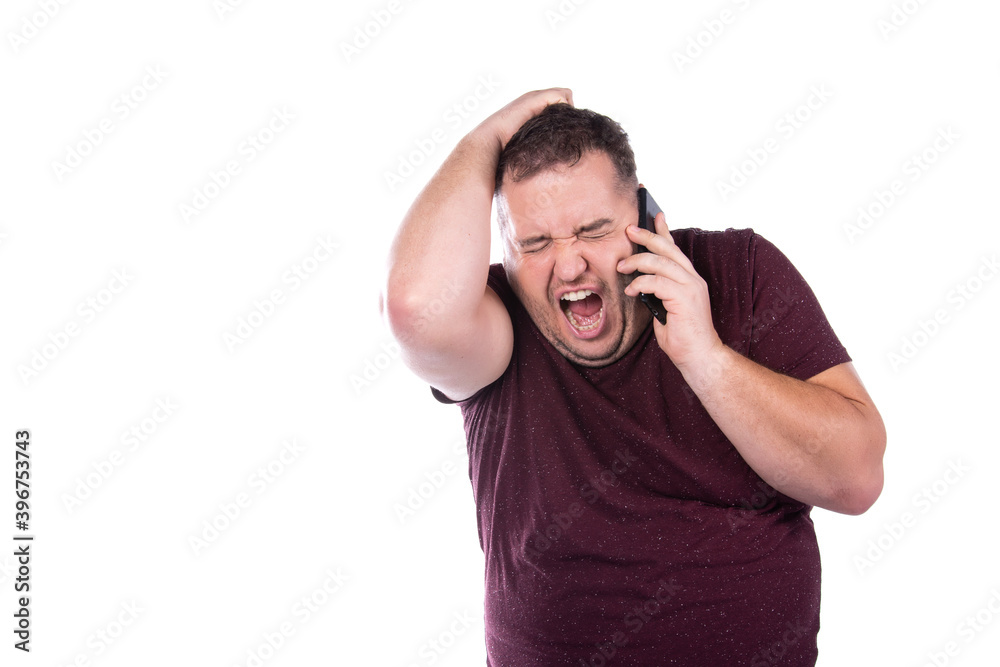Fat man swears on the phone. Business and work. Fat man swears on the phone. Business and work.