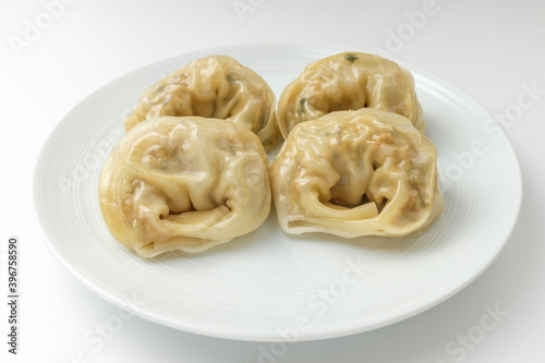 Dumplings with meat on a white background