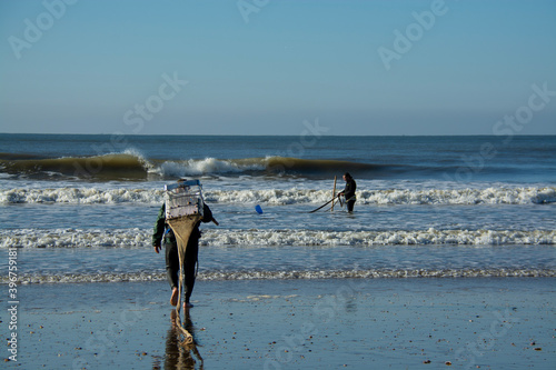 fisherman seafood shelfish ocean beach photo