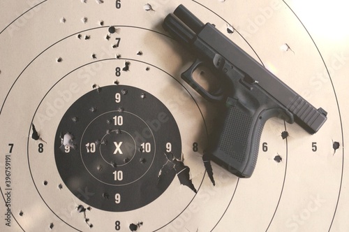 Goal setting with target, objectives and planning concept, top view, You can make a great target of business like a bullet target, gun and bullet holes on paper target