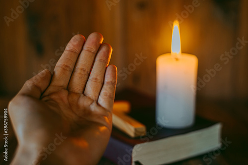 A woman sitting and reading the bible And pray for God's blessing with faith in His power The idea of faith in the sacred power of God through prayer to Him Christianity, Jesus photo