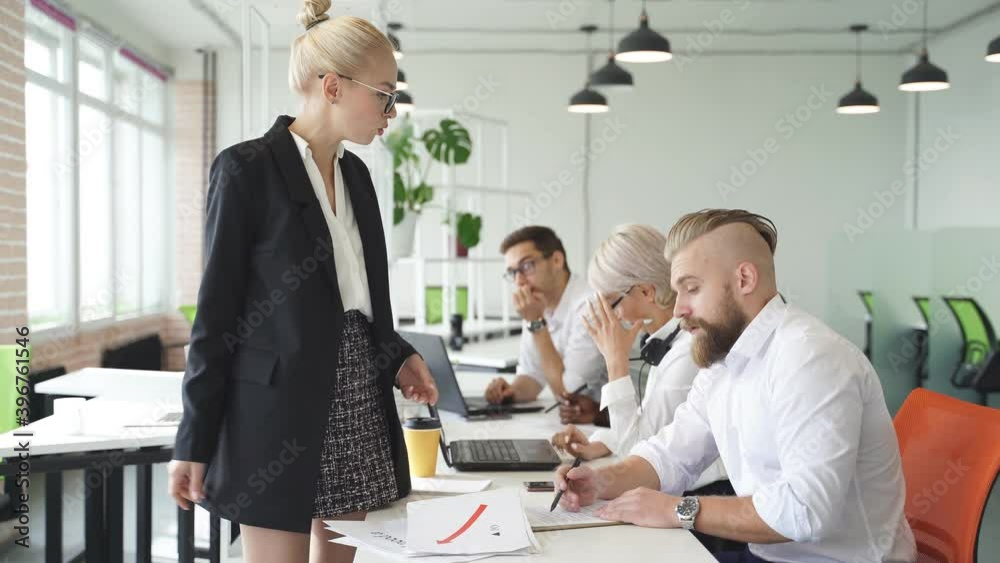 Angry female director is dissatisfied with work of employees, need new team, bad work concept, going to fire employees. Angry female director is dissatisfied with work of employees, need new team, bad work concept, going to fire employees.