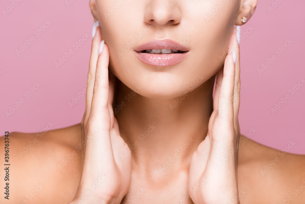cropped view of beautiful woman with perfect skin touching face isolated on pink cropped view of beautiful woman with perfect skin touching face isolated on pink