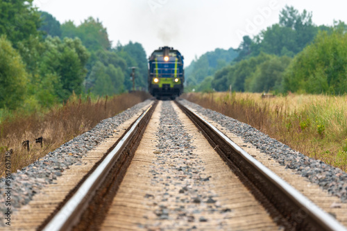 On the tracks, an approaching train to cross