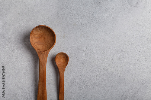 Wooden spoons on a light background