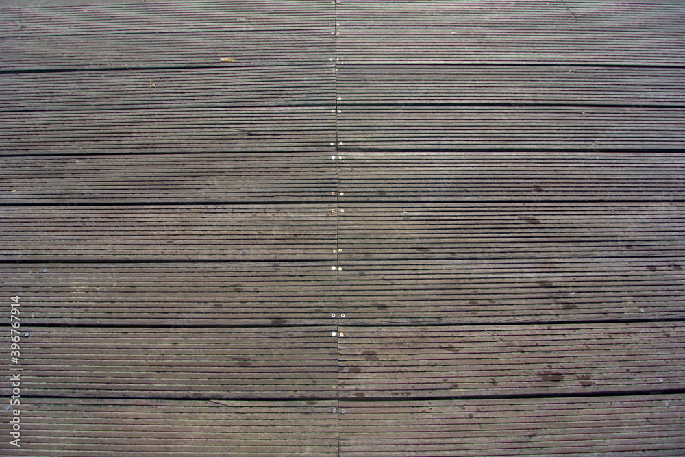 A wooden plank walkway surface