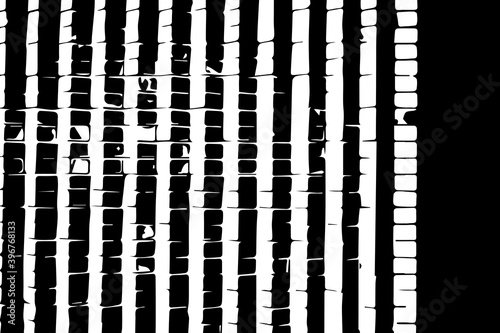 Abstract black white image with long and short intermittent liquid lines made by brush. A monochrome image drawn by hand. Dirty shabby smears of black paint. Vector eps illustration.