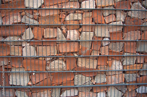 Obraz na płótnie A fenced brick wall background w salonie