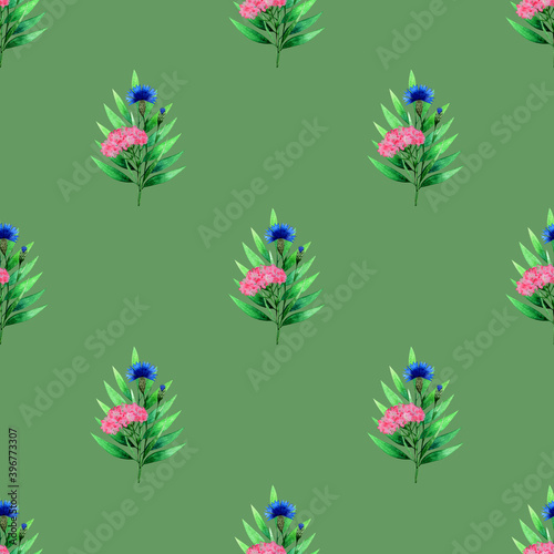 Wild flowers seamless pattern with blue cornflowers,green leaves and pink botanical elements.Floral watercolor background.Hand drawn illustration.For fabric designs,wrapping paper,textiles,printables.