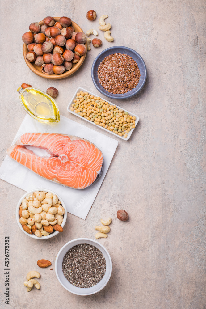 Omega 3 food sources and omega 6 on concrete background, top view copy