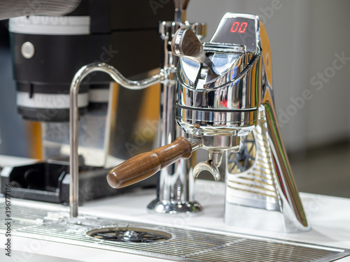 Beautiful modern coffee machine new. Secret coffee machine, perfectly fits into any interior of a bar, restaurant, cafe and coffee shop. modern coffee shop with modern equipment. Coffee shop equipment photo