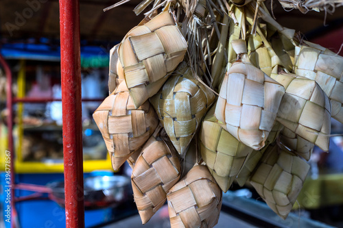 Grass braided bag bunch, traditional woven craft of Philippines. Small pack for Christmas gift. Native kete braided pocket. Tourist souvenir in the Philippines