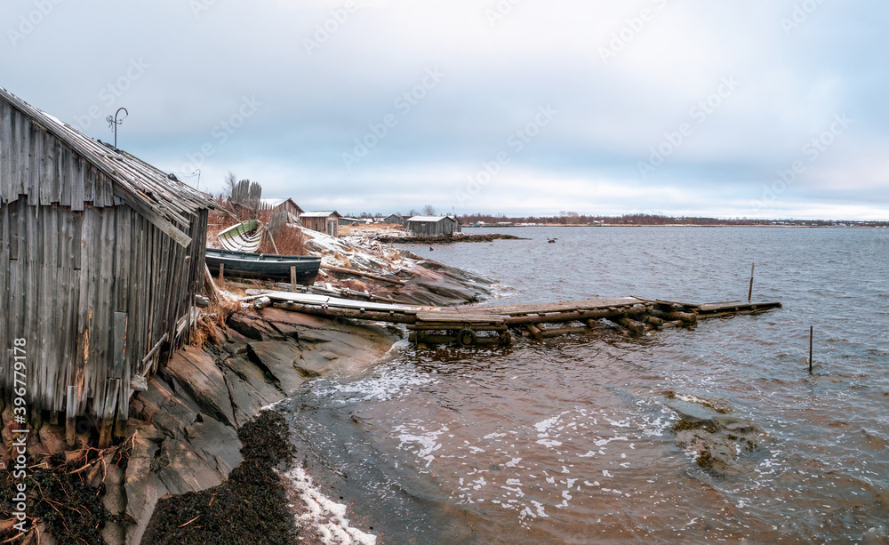 Panoramic view of Kem. Fishing village Rabocheostrovsk on the shore of the White sea during low tide.